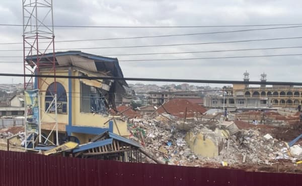 Asokore Mampong Assembly pulls down bank to make way for 24-Hour Economy market despite legal battle