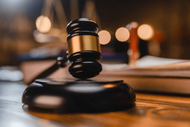 Three remanded over alleged concealment of 869 cocaine slabs in gari