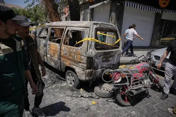 At least 18 injured in Damascus as explosions disrupt Macron visit 