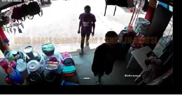 CCTV captures two boys stealing cash from a shop